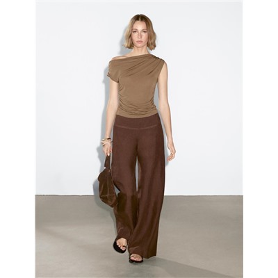 Top asimétrico detalle drapeado