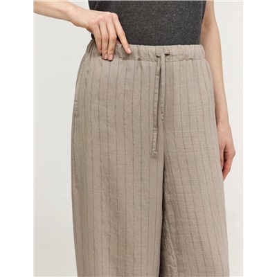 Бежевые брюки в полоску