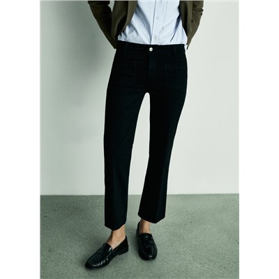 Jeans flare crop bolsillos