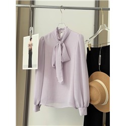 Элегантная, нежная блузка с длинными лентами на горловине