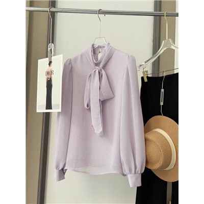 Элегантная, нежная блузка с длинными лентами на горловине