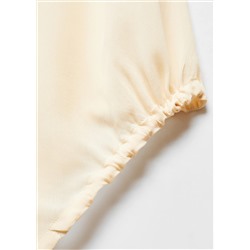 Top semitransparente fruncido lateral