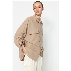 TRENDYOL MODEST Taş Kolları Ayarlanabilir Büzgü Detaylı Dokuma Pamuklu Gömlek TCTSS23TG00011