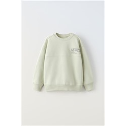SUDADERA TEXTO BORDADO ETIQUETA