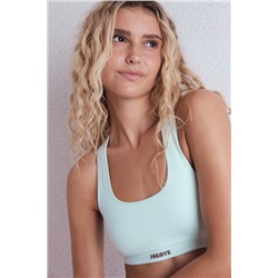 Top deportivo seamless canalé verde