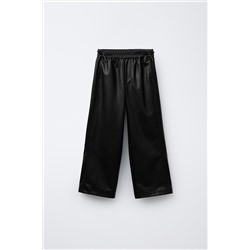 FAUX LEATHER TROUSERS WITH BOWS