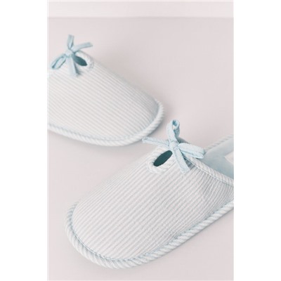 Conjunto de zapatillas y neceser