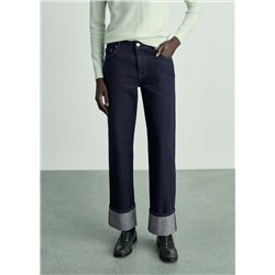 Jeans rinse wash bajo vuelto