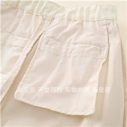 Интересная модель женских вельветовых свободных брюк со складками на талии