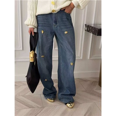 Женские стильные джинсы украшенные золотыми пуговицами особой формы  Schiaparell*i