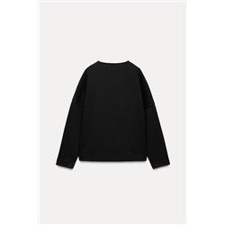 INTERLOCK V-NECK TOP