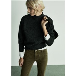 Jeans flare crop bolsillos