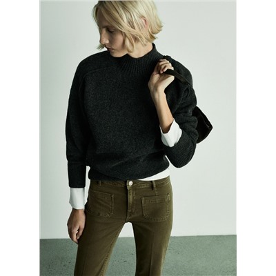 Jeans flare crop bolsillos