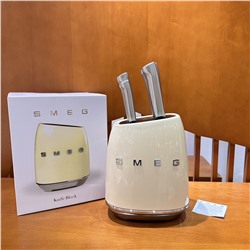 Набор из 7 предметов для ретро-ножей SMEG Blue Knife, потолок стоимости ножей  Нож изготовлен из импортной нержавеющей стали марки 304, которая безопасна, полезна для здоровья, долговечна и износостойка. Интегрированная ручка очень удобна и легка в использовании.  В комплект входят универсальный нож, нож для мяса, нож сантоку, нож для хлеба, поварской нож и подставка для ножей, всего 7 предметов!