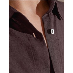 Свободная удлиненная блузка с карманом изо льна с вискозой