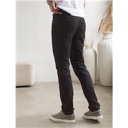 Джинсы зауженные из эластичного денима