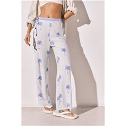 Pantalón largo estampado rayas palmeras