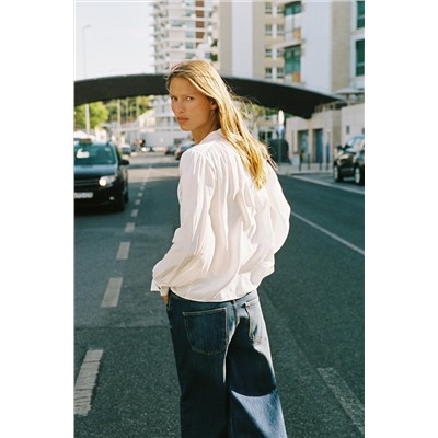 SHIRT WITH SHOULDER PADS