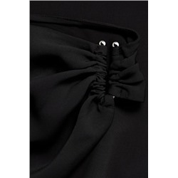 Vestido asimétrico detalles drapeados