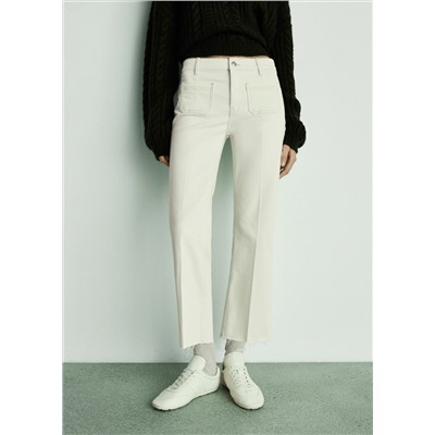 Jeans flare crop bolsillos