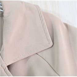 Элегантный тренчкот в ретро-британском стиле