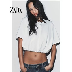 Женская укороченная футболка с объемным подолом  ЗАР*А