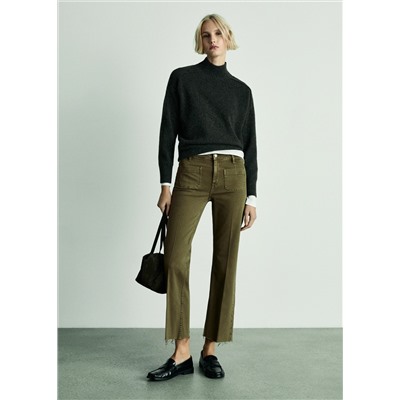 Jeans flare crop bolsillos