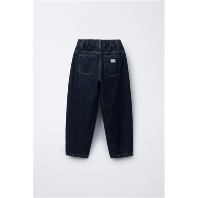 PLEATED BALLOON-FIT DENIM TROUSERS