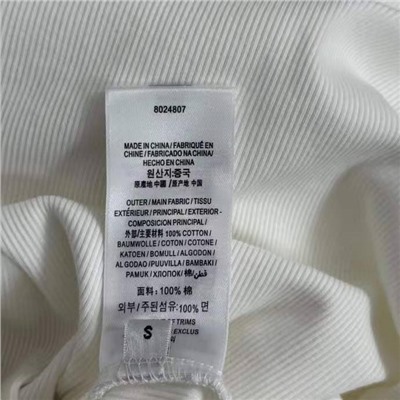 Женский лонгслив Schiaparell*i с защипами на талии и металлической брошью