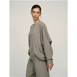 Зеленая блузка «Паук» с кольцом на рукаве