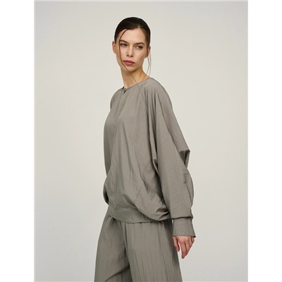 Зеленая блузка «Паук» с кольцом на рукаве