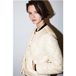 Cazadora acolchado cuello redondo