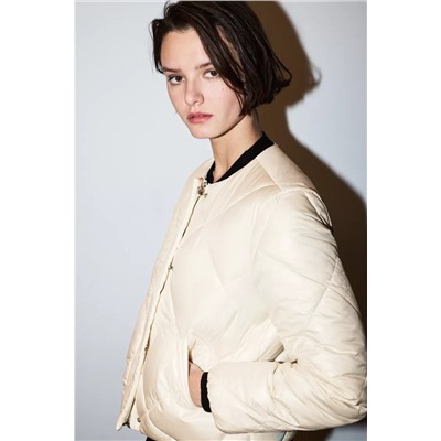 Cazadora acolchado cuello redondo