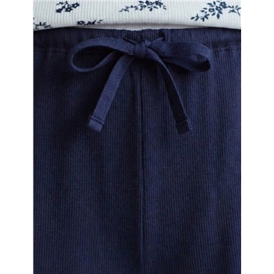 Прямые брюки с поясом на резинке из фактурного трикотажа в рубчик