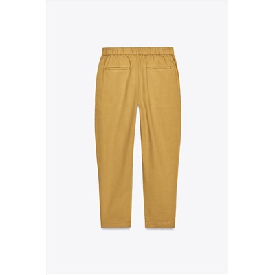 JOGGER TROUSERS WITH BUTTONED HEMS