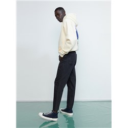 Jeans im Carrot-Fit mit tieferem Schritt