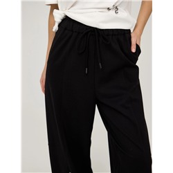 Черные брюки-баррель с закрепками