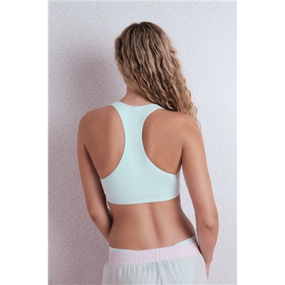 Top deportivo seamless canalé verde