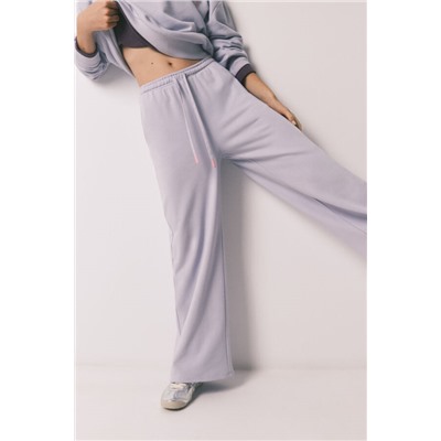 Pantalón largo flare felpa lila