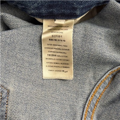 Женские стильные джинсы украшенные золотыми пуговицами особой формы  Schiaparell*i