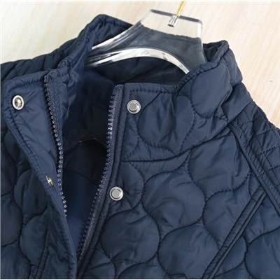 Женский стеганый жилет-стойка