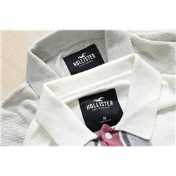 Мягкий и контрастный вязаный кардиган с короткими рукавами и отворотами