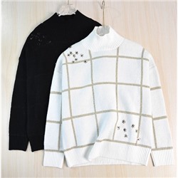 Элегантный и свободный трикотажный свитер