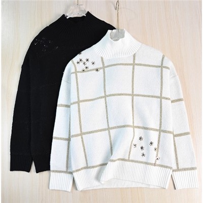 Элегантный и свободный трикотажный свитер