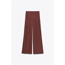 WIDE FLOWING TROUSERS