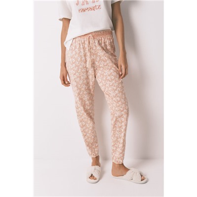Pantalón skinny 100% algodón flores naranja