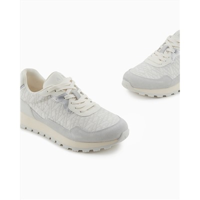 Sneakers with allover logo inserts