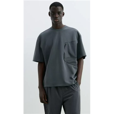 Camiseta bolsillo cremallera