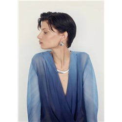 Blusa cruzada semitransparente