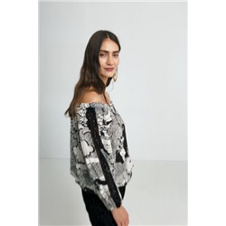 Blusa blanca y negra encaje mangas